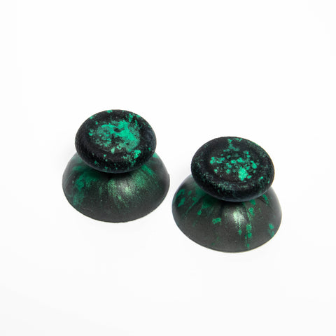 Black and green resin PS5 buttons