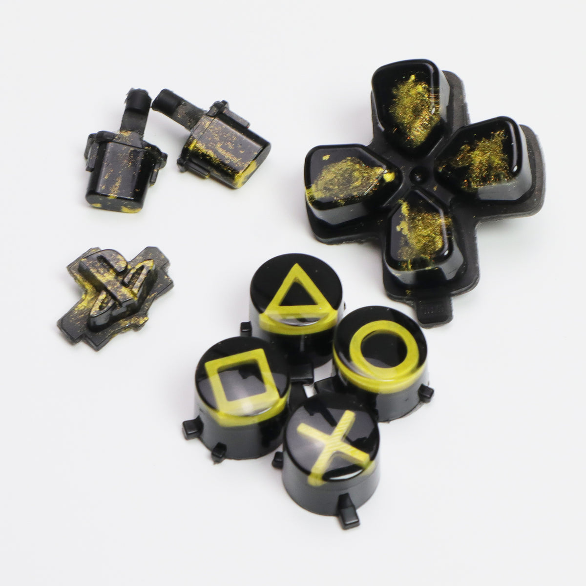 Black and yellow resin PS5 buttons