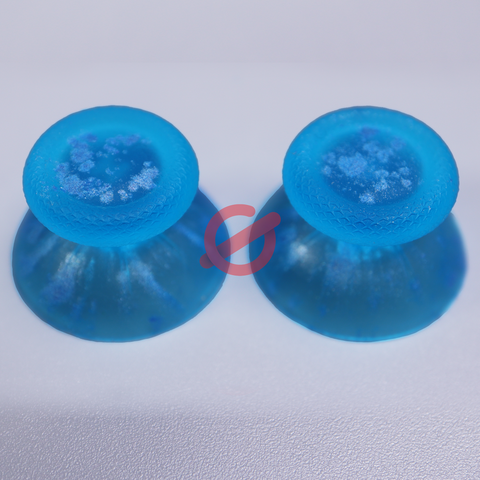 Black and light blue resin PS5 buttons